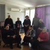 Representatives of the Crisis Center for Victims of Violence Services visit the old people's home